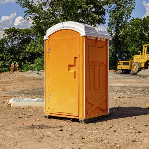 what is the cost difference between standard and deluxe porta potty rentals in Brookeland